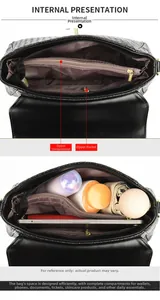 Internal view of woven leather crossbody bag with multiple zipper compartments and storage space