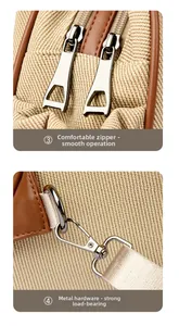 Detail of smooth metal zipper pulls and durable hardware on woven leather backpack