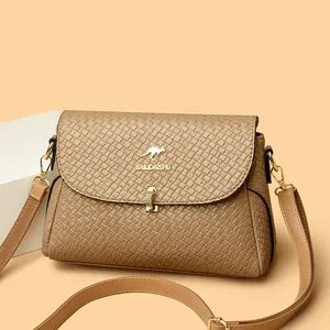 Khaki woven texture crossbody bag with gold kangaroo logo and decorative metal clasp
