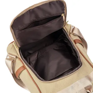British style khaki canvas backpack with large capacity interior and leather trim