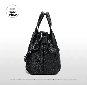Side view of black snakeskin bucket bag featuring elegant metal chain and scale texture
