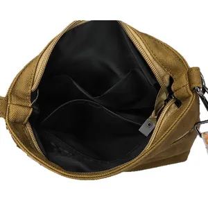 Interior view of quilted bucket bag featuring a black fabric lining and multiple pockets