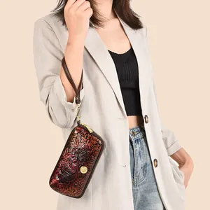 Vintage leather clutch bag with embossed peony flowers and gold zipper for women