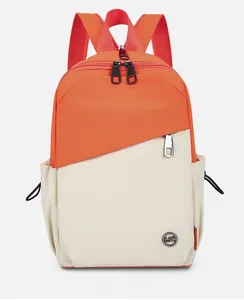 Detailed front view of a color-block backpack featuring orange and beige nylon material