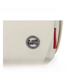 Detail of LST logo and vertical ribbed texture on a cream lightweight crossbody bag