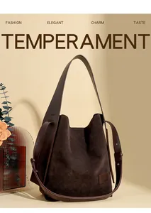 Detail view of dark brown suede bucket bag featuring high-quality matte leather texture