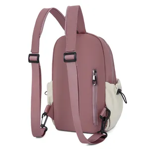 Contrast color waterproof backpack in dusty pink and cream white with adjustable straps