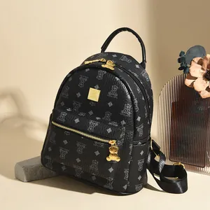Mini zwarte rugzak voor dames met berenprint en luxe goudkleurige metalen details