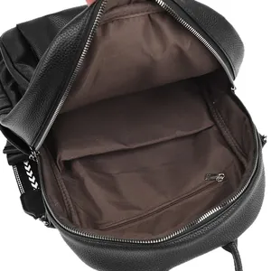 Black leather backpack with spacious main compartment, brown lining and zip pocket