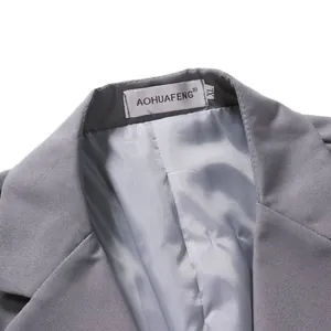 Close-up of gray blazer collar with high-quality stitching and XL size brand label
