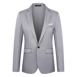 Macro detail of slim fit grey blazer lapel with single button and white pocket trim