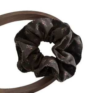 Vintage dark brown floral scrunchie hair tie made of lightweight chiffon fabric