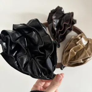 Elegant pleated PU leather banana hair clip for women in black and brown colors