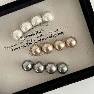 Détails des barrettes à perles vintage françaises en blanc crème, doré et gris