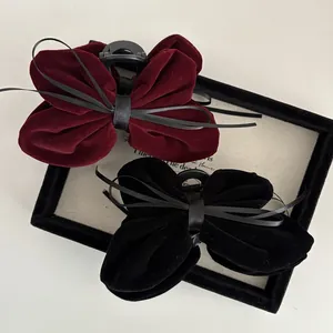 Velvet bow hair claw clip set in black and burgundy with long satin ribbons