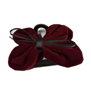 Elegant burgundy velvet bow hair claw clip with black ribbon accent on white background