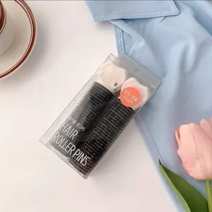 Hair roller pins set for root volume and styling in clean minimalist setting