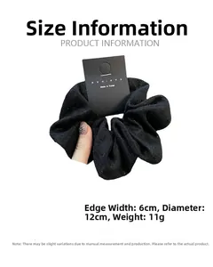 Detailed size specifications of black lace scrunchie showing 12cm diameter and weight