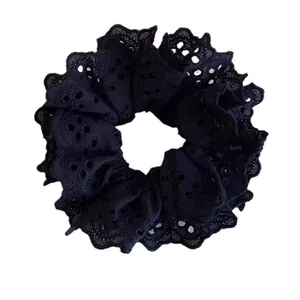 Elegant black embroidered lace scrunchie with double-layer ruffle design for women