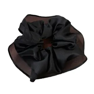 Elegant satin and sheer mesh scrunchie hair tie in classic black and coffee brown