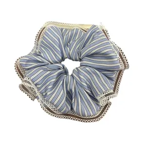 Blue striped scrunchie with layered lace edges for elegant Korean style hair styling