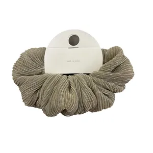 Elegant champagne gold pleated scrunchie with metallic sheen made in Korea hair tie