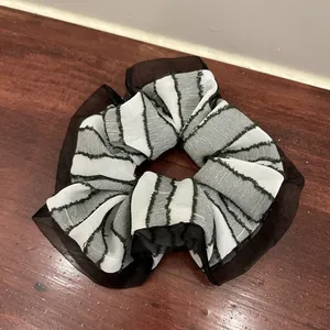 Black and white striped mesh hair scrunchie with layered lace design for buns