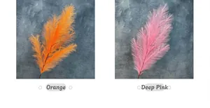 Detalle de hierba pampa artificial naranja y rosa intenso con suave textura sedosa
