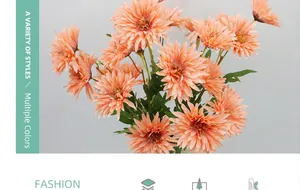 Dettaglio di margherita artificiale rosa arancio con petali multistrato e foglie