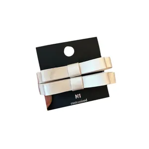 Juego de pinzas de lazo de satén blanco en tarjeta para accesorios de peinado elegantes