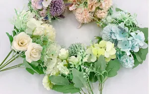 Detailed close-up of realistic silk rose and hydrangea bouquet in Morandi colors