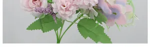 Close-up of artificial rose and hydrangea bouquet with realistic fabric petal details