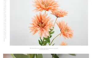 Dettaglio di cinque teste di fiori di crisantemo finti in tonalità arancio rosa