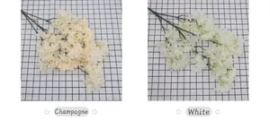 Detailansicht künstlicher Kirschblüten in Champagner und Weiß mit dichten Seidenblütenblättern