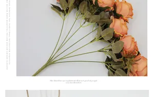 Vista detallada de rosas artificiales de terciopelo naranja con hojas y tallos reales
