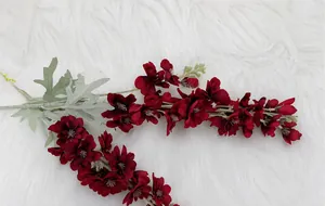 Detail showing premium dark red silk delphinium flowers with realistic petal textures