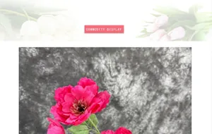 Close-up of vibrant red artificial peony petals and detailed stamens with green leaves