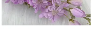 Macro detail of artificial purple delphinium petals with realistic floral texture