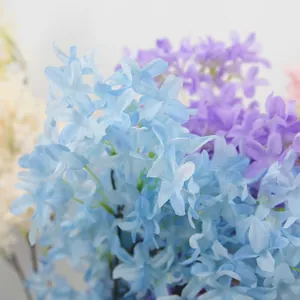 Artificial purple cherry blossom branch for wedding decor and home floral photography
