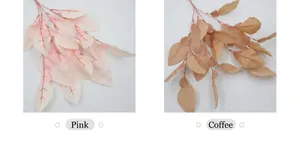 Detailansicht von künstlichen Pomeloblättern in Rosa und Kaffee für Hochzeitsdekoration