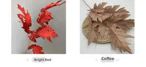 Detail view of artificial oak leaves in bright red and coffee brown with serrated edges