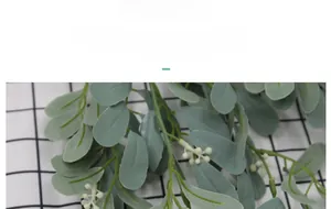 Detailed view of high-quality silk fabric leaves with realistic texture and white berries