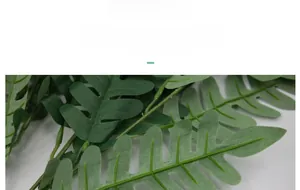 Detailed macro view showing realistic leaf veins and texture of green artificial locust leaves