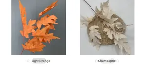 Comparison of artificial oak leaves in light orange and champagne colors for decor