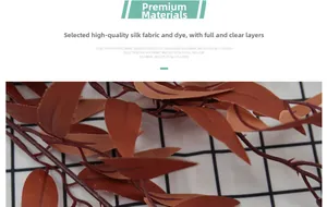 Close-up of premium silk fabric artificial willow leaves in rusty red with realistic texture