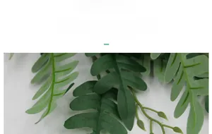 Close-up of artificial locust tree leaves showing realistic texture and green shades