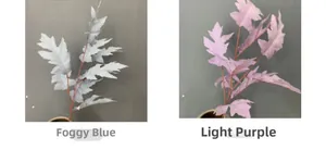 Detail view of artificial sawtooth oak leaves in fog blue and light purple for home decor