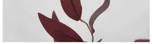 Close-up of deep burgundy artificial willow leaves with realistic texture and veins