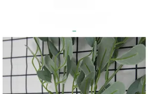 Detailed view of artificial peanut leaves with realistic grey-green texture and stems