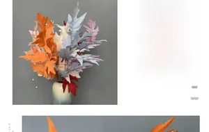 Detail of colorful artificial oak leaves with jagged edges for wedding floral arrangements